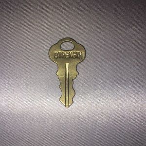 The Giving Keys key charm pendant